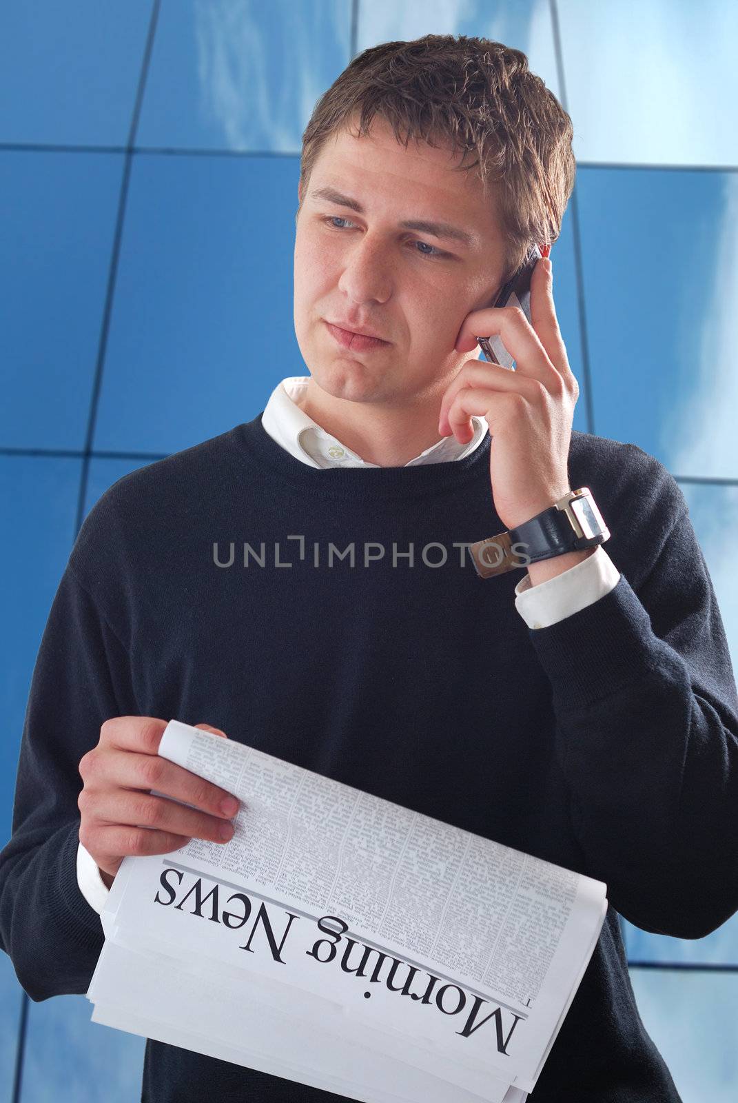 young businessman read morning news