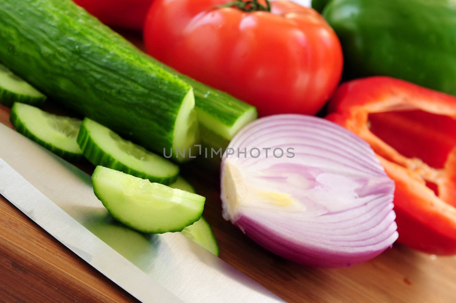 Fresh garden vegetables on cutting board - ingredients for a salad