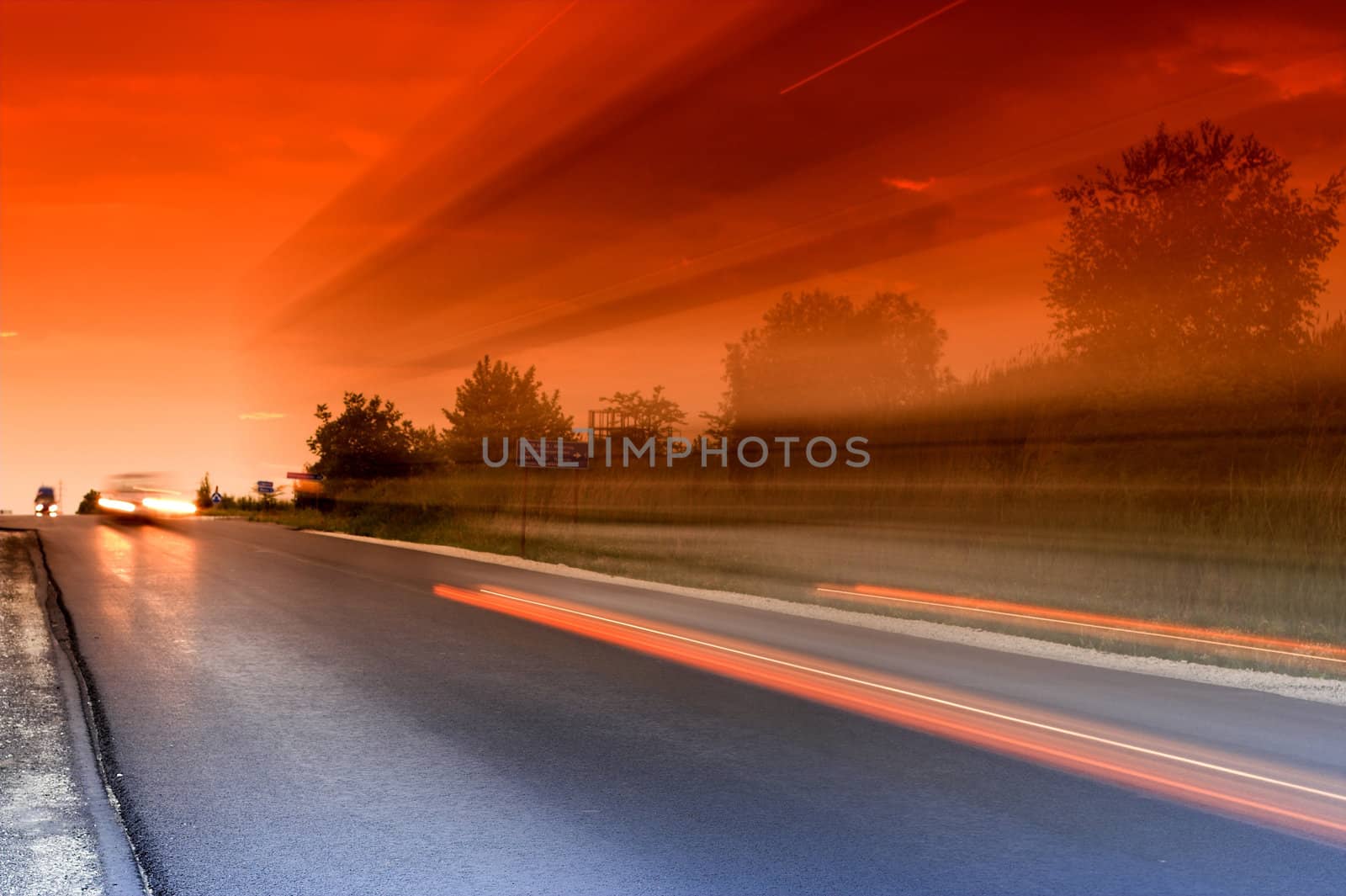 lihgttracks over the highway by night