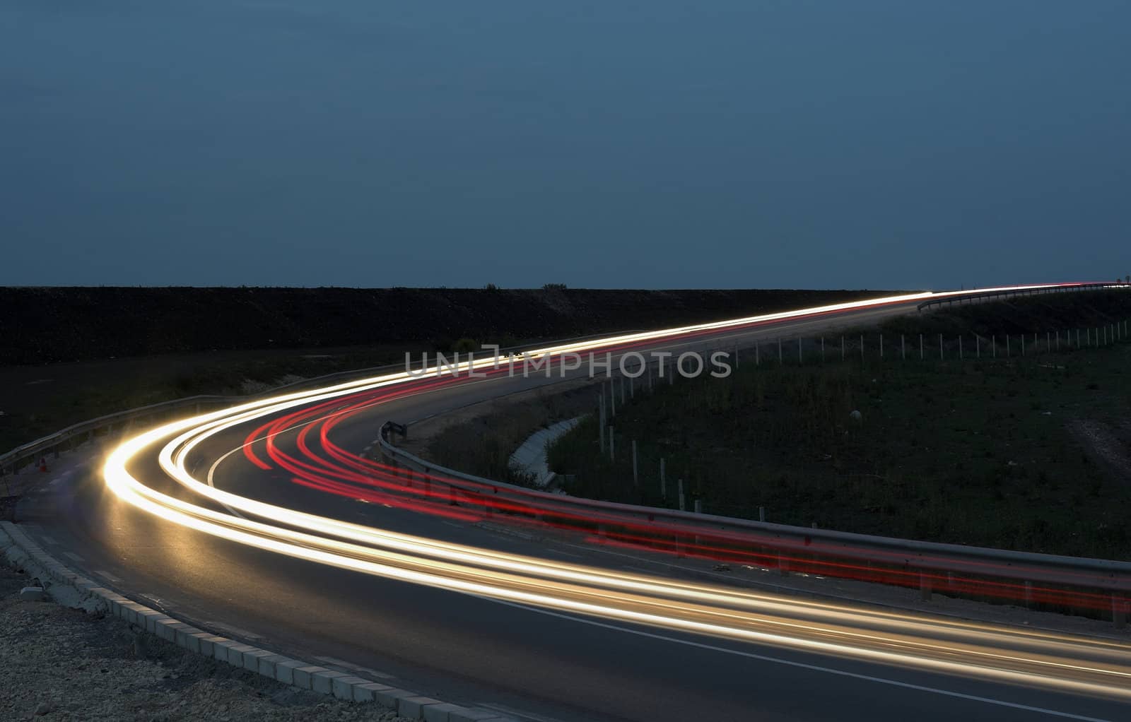 lihgttracks over the highway by night