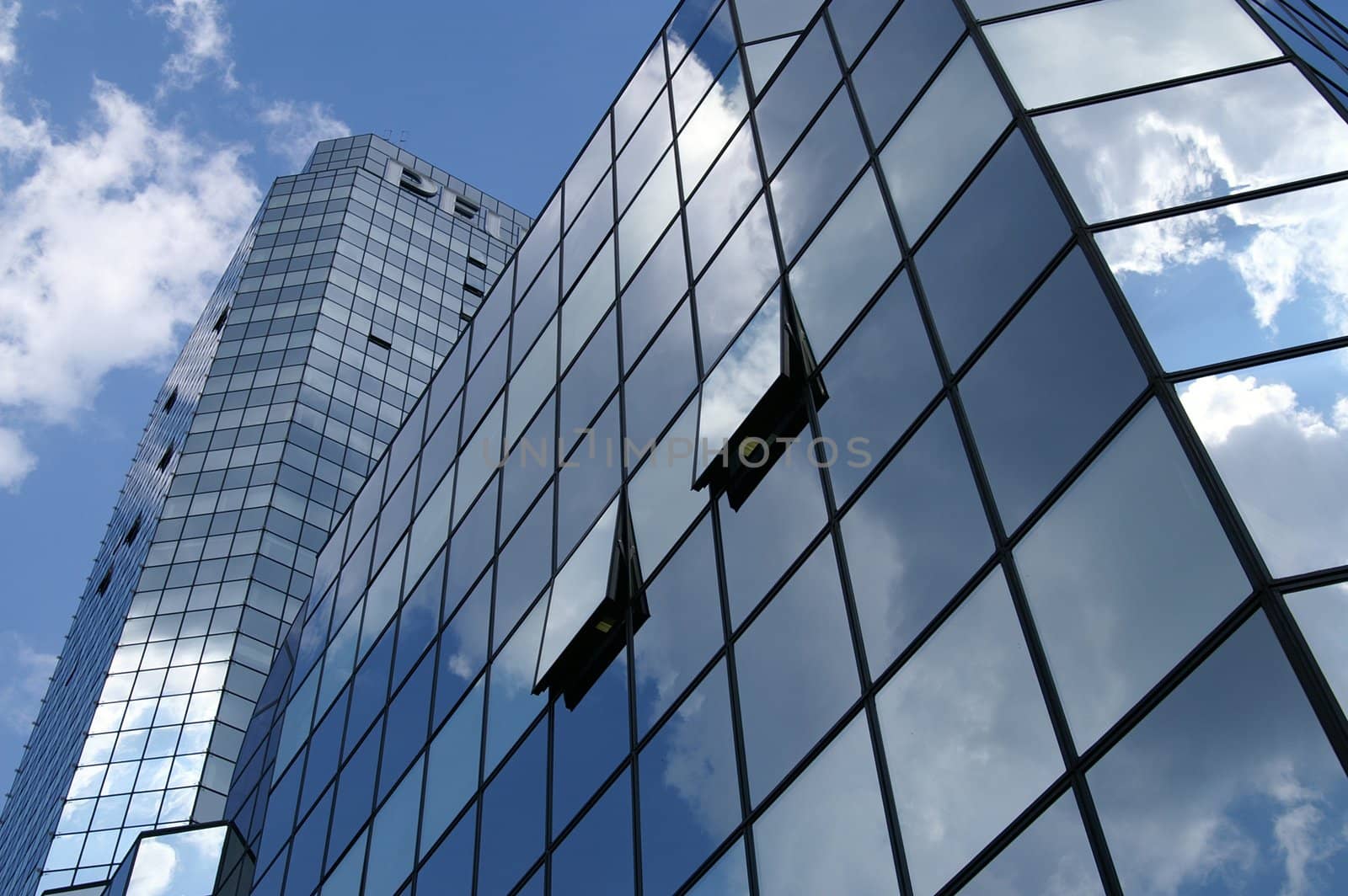 Glass building front, cloudy sky, Bank square