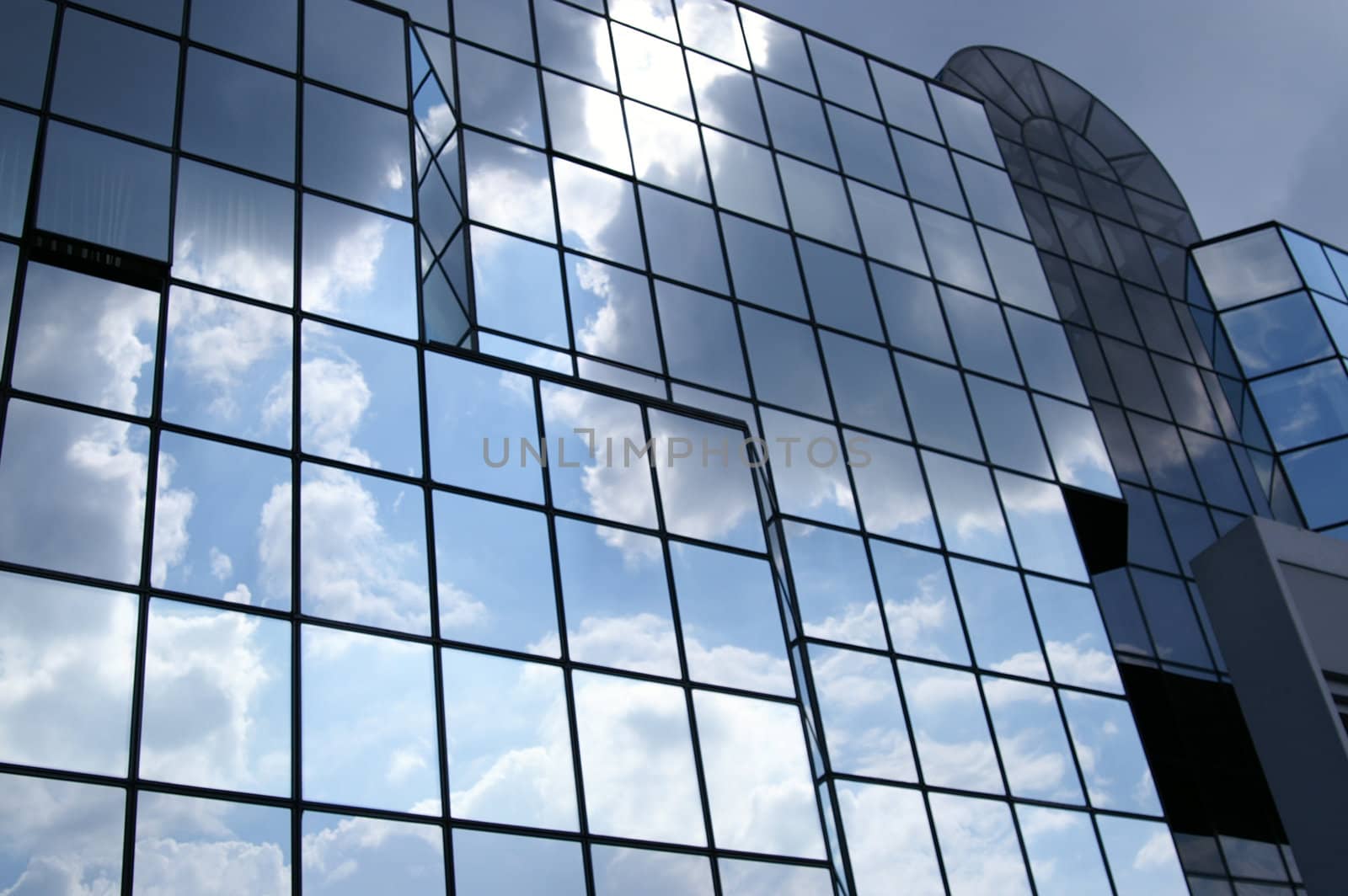 Glass building front, cloudy sky, Bank square