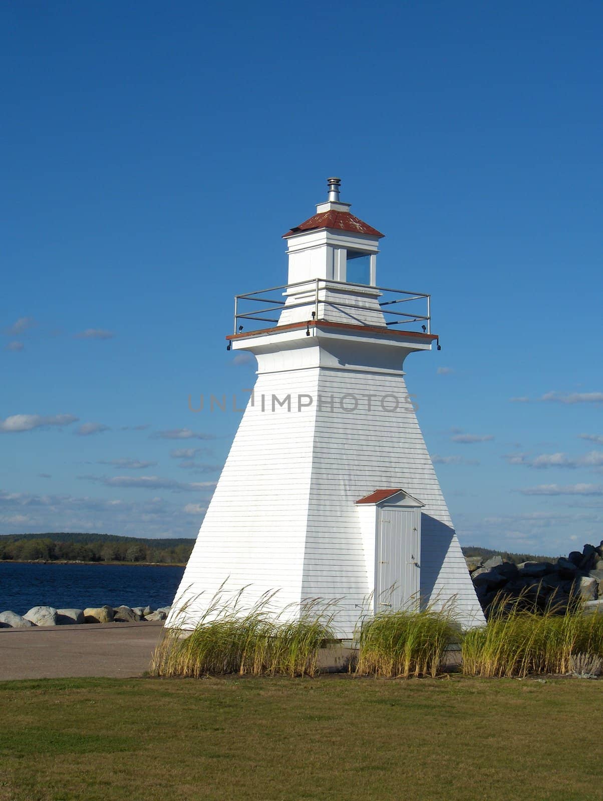 A white painted lighthouse in Nova Scotia.