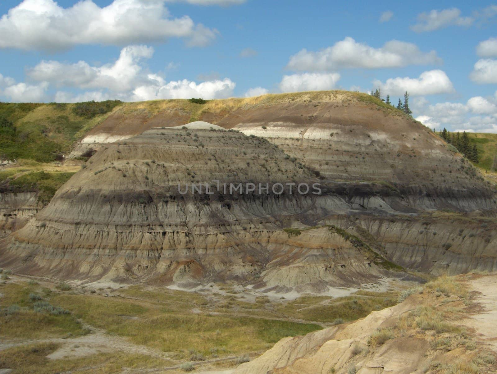 A view of the Canadian badlands near Drumheller, Alberta, where many dinosaur fossils have been found.