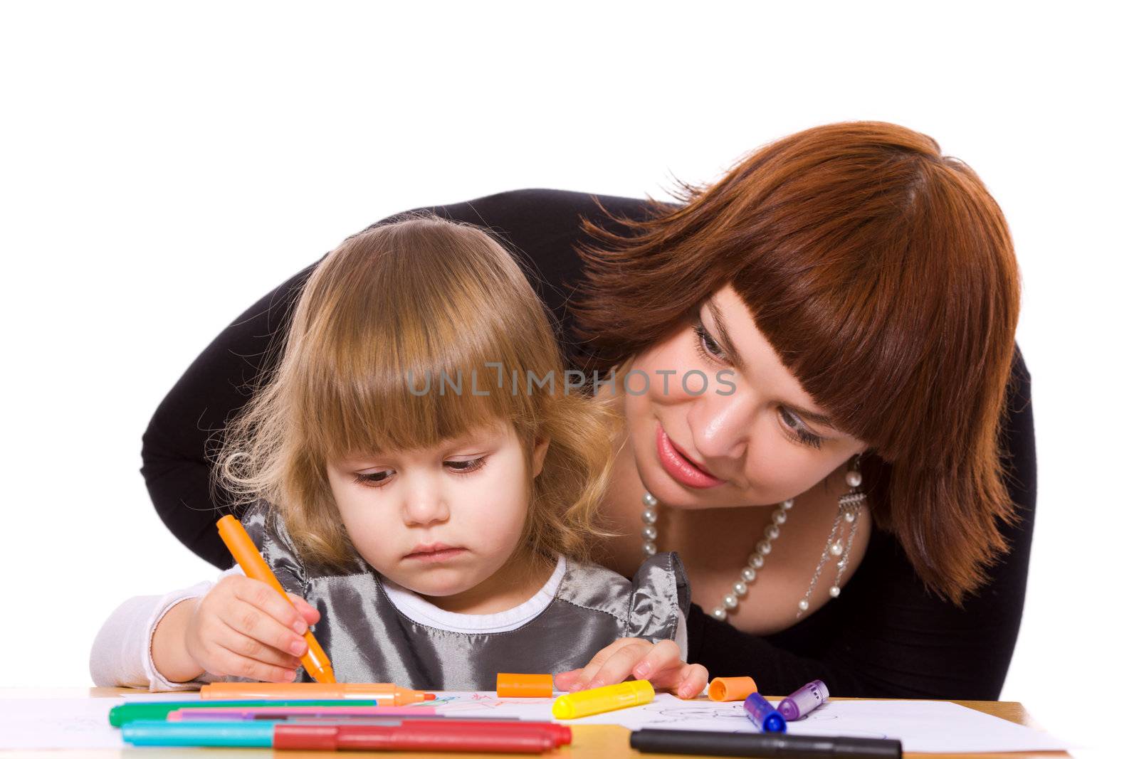 Mother helping daughter to draw isolated on white