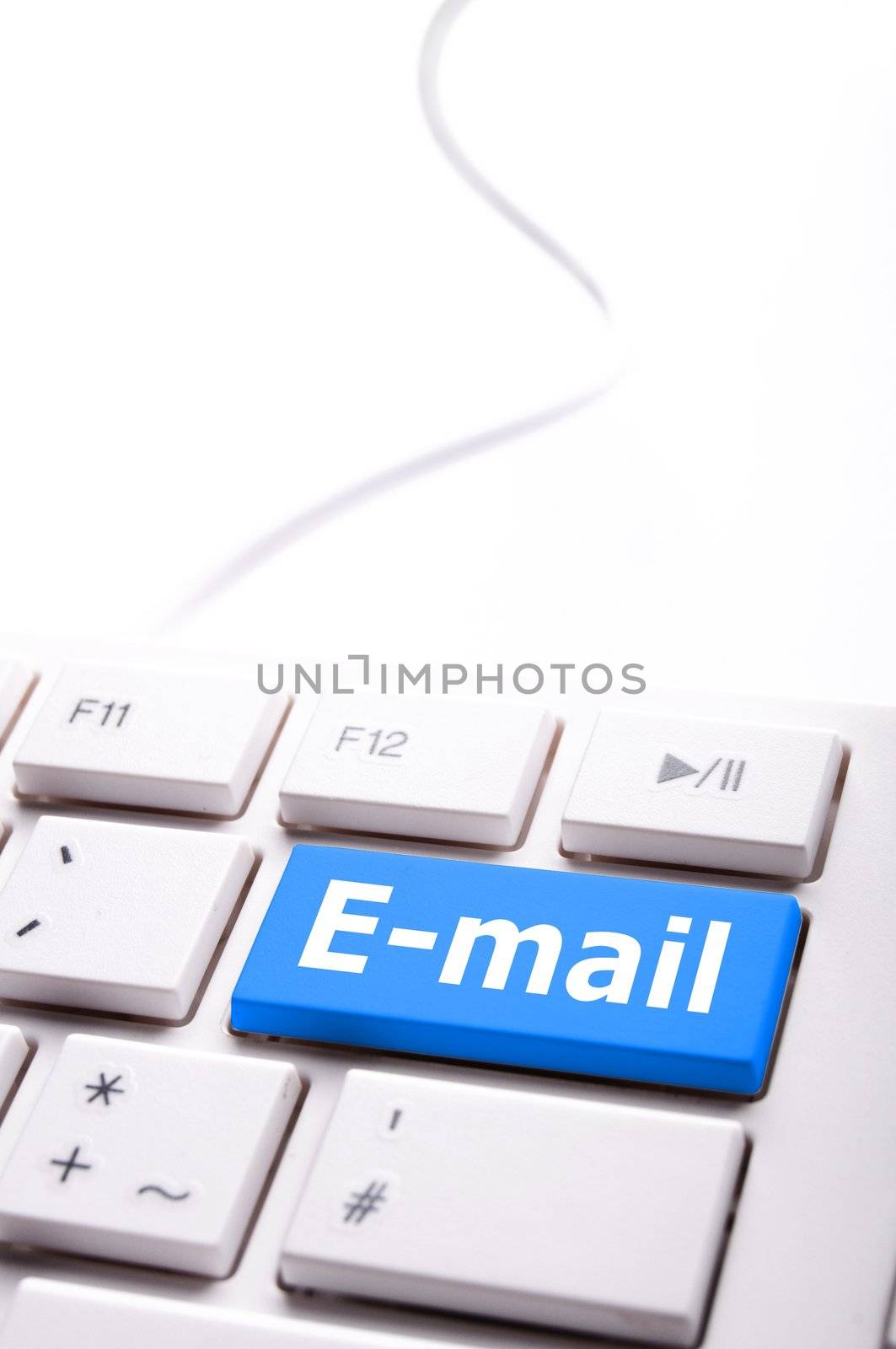 email concept with blue key or buttoen on comuter keyboard