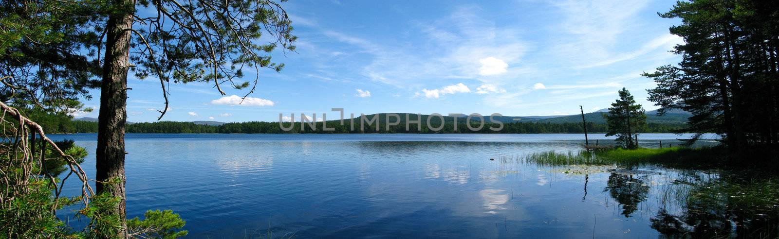 Panorama of three photos stitched of beautiful lake