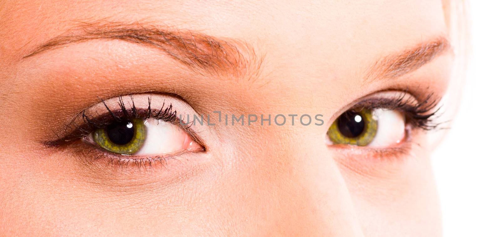 Close-up of Beautiful green eyes of young girl
