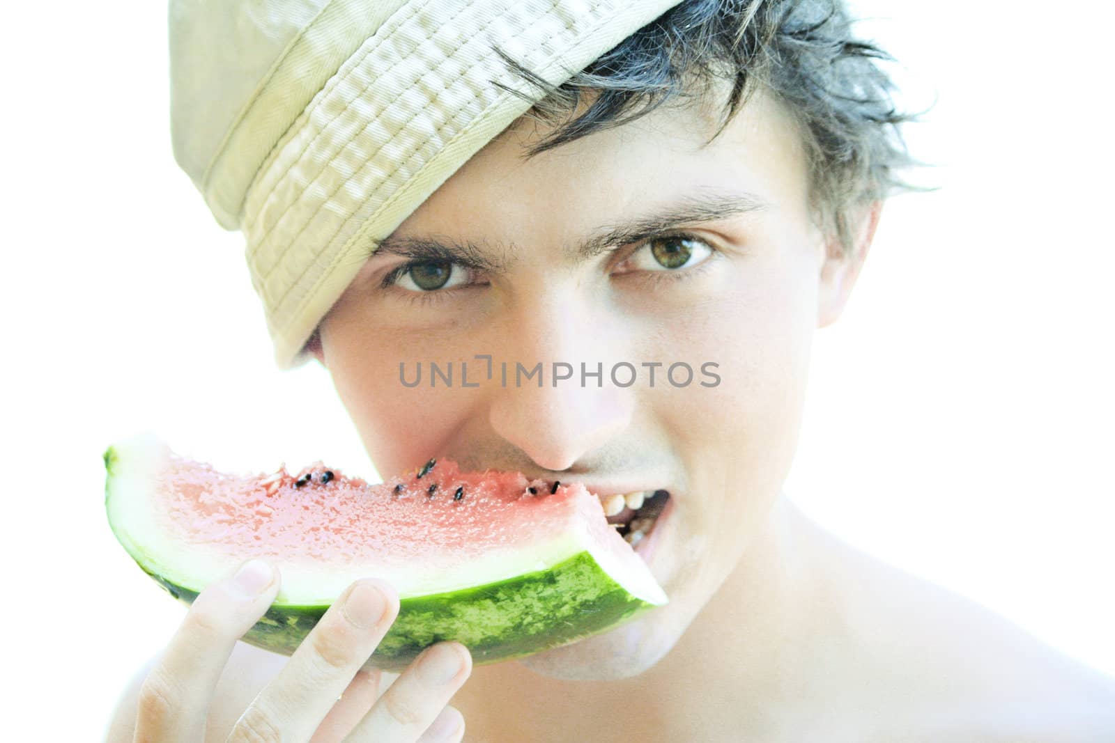 young boy with a slice of watermelon