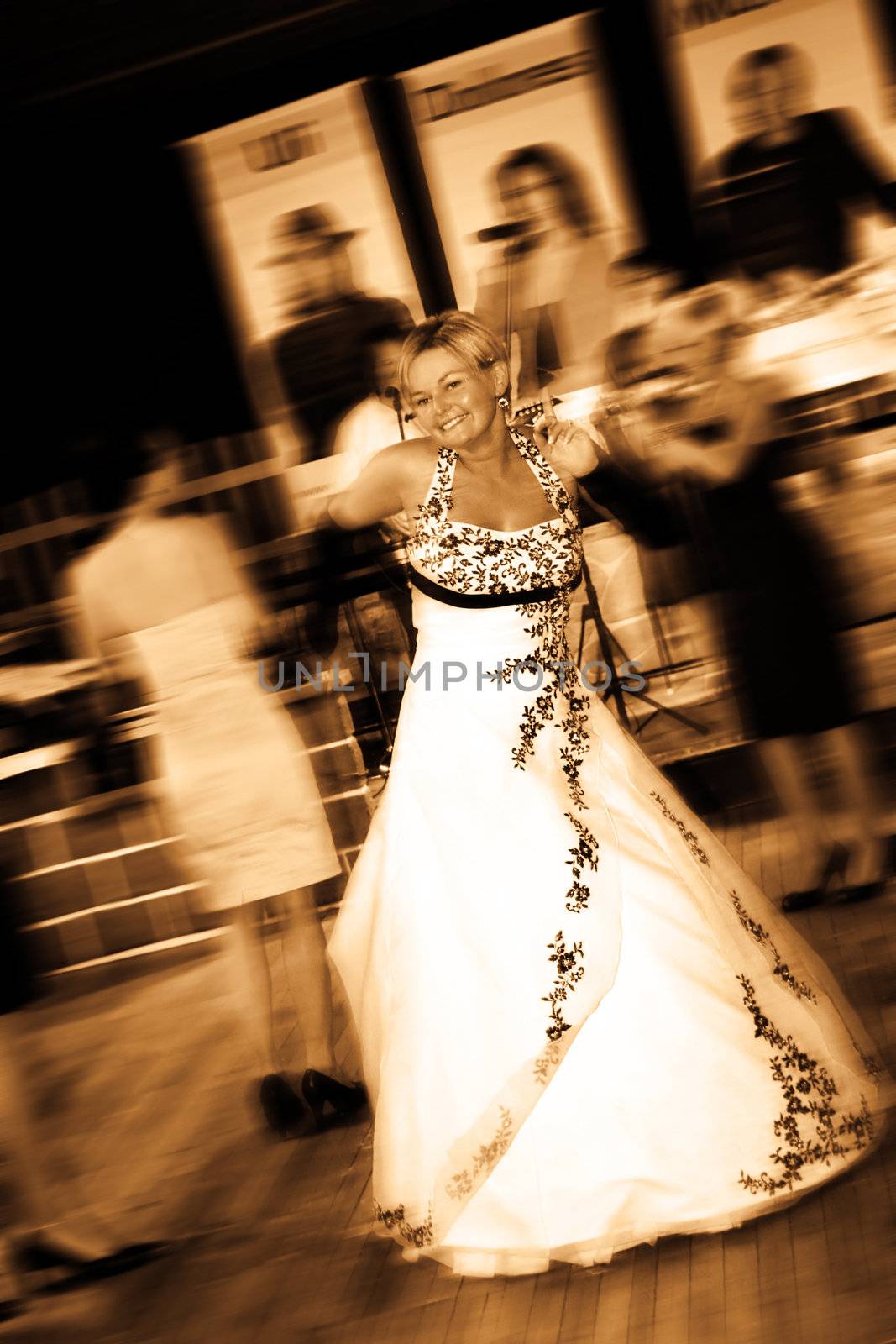 Bride is dancing around at the wedding party