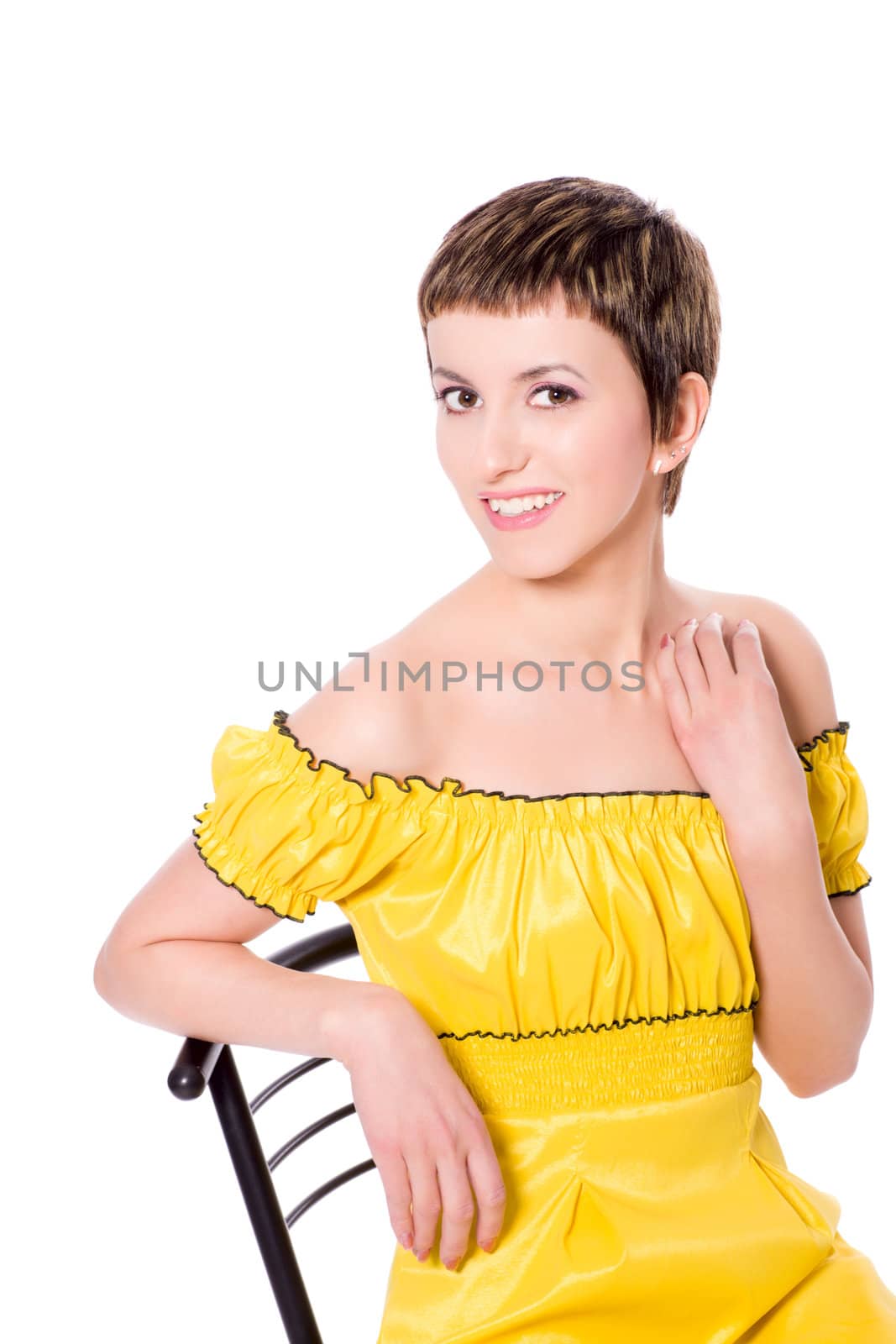 beautiful young woman wearing yellow dress isolated on white