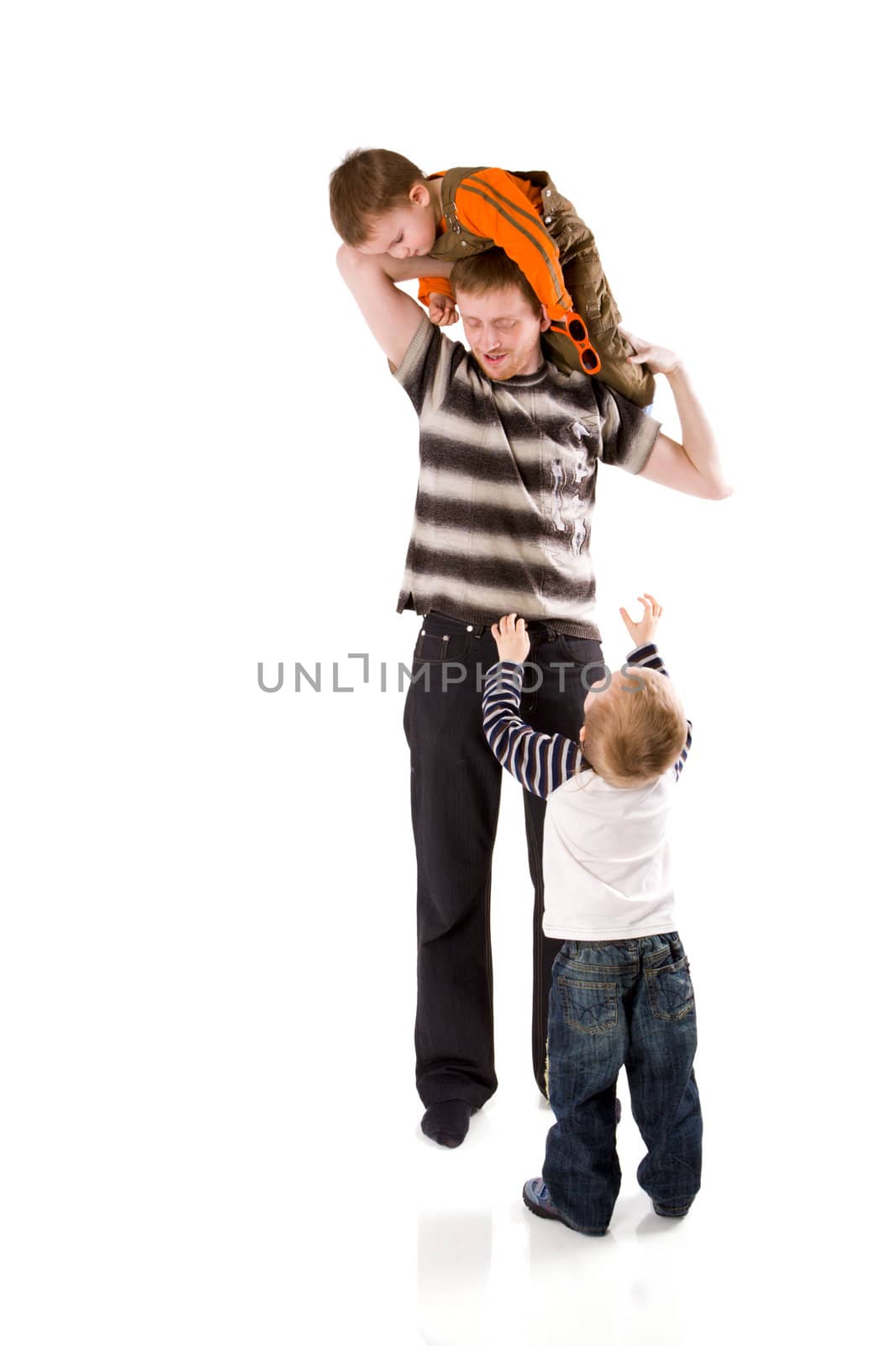 Happy Father playing with two sons isolated on white