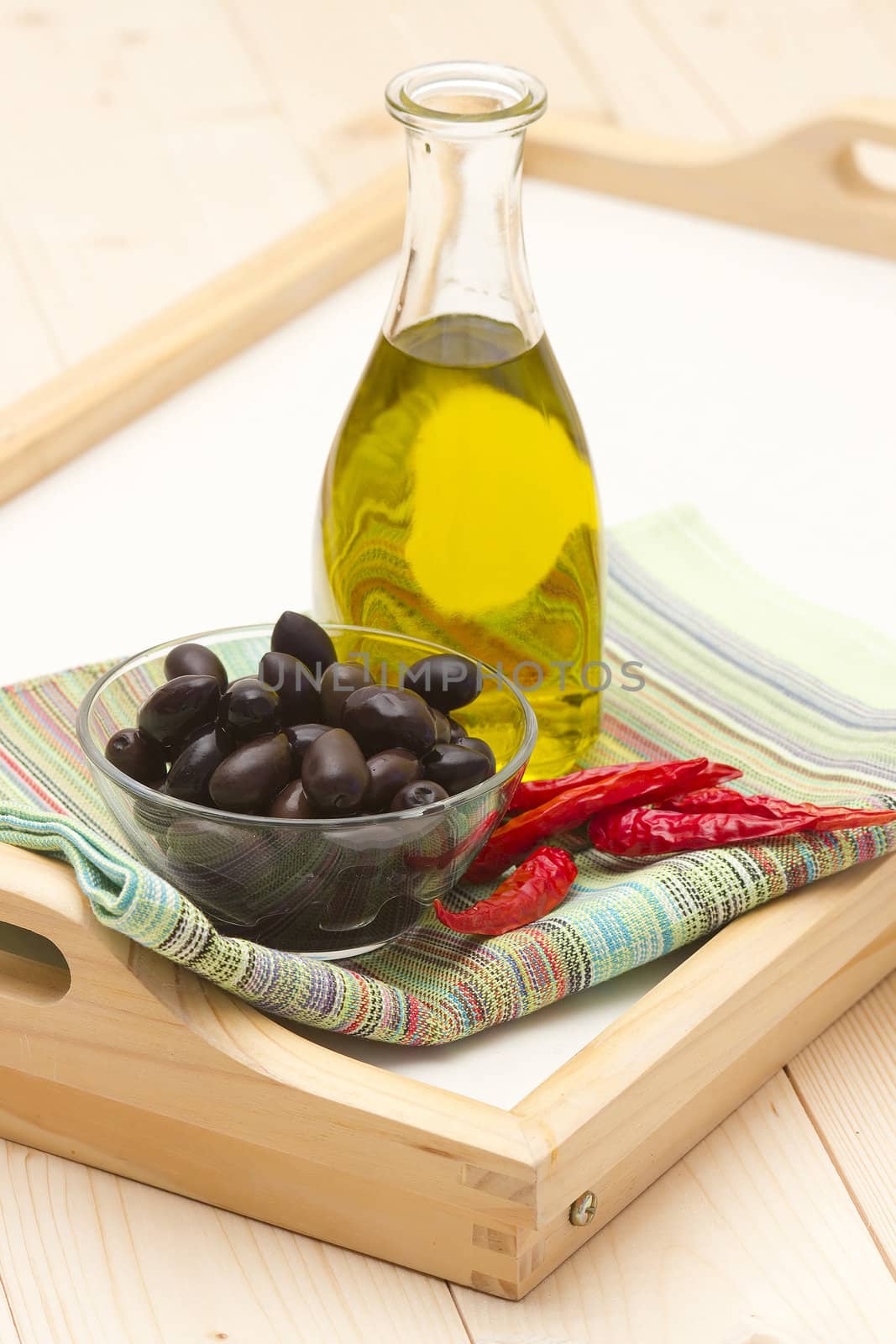 olive oil, black olives, chili peppers by miradrozdowski