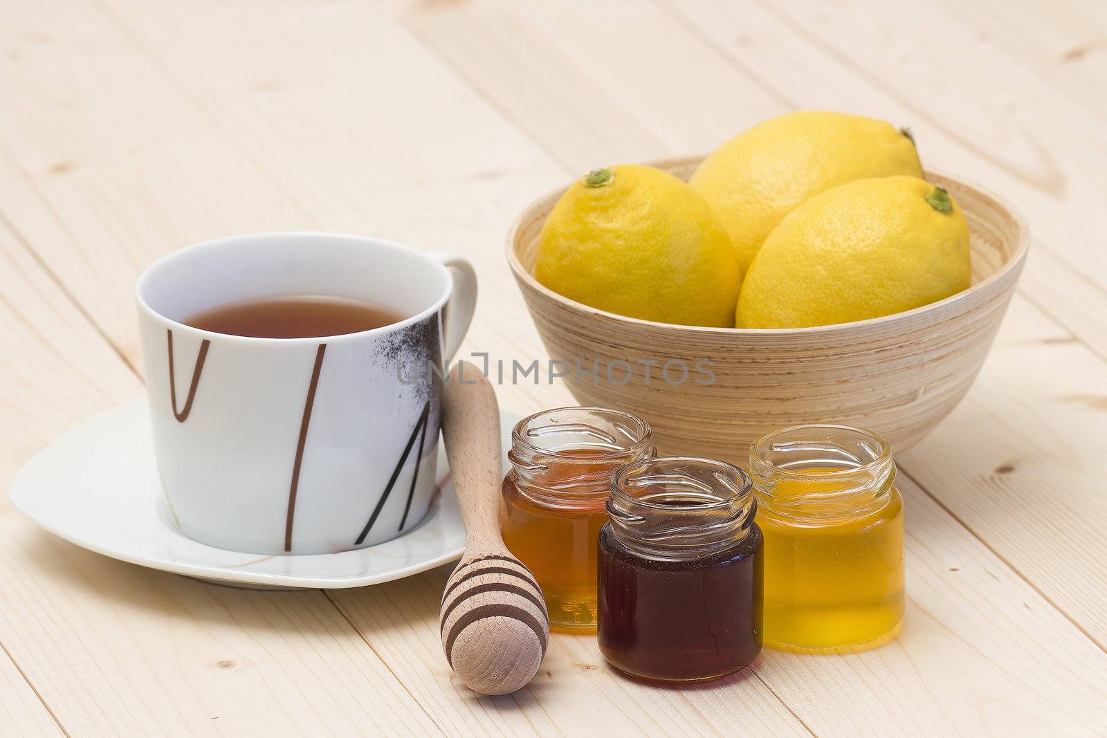cup of tea, fresh lemons and honey