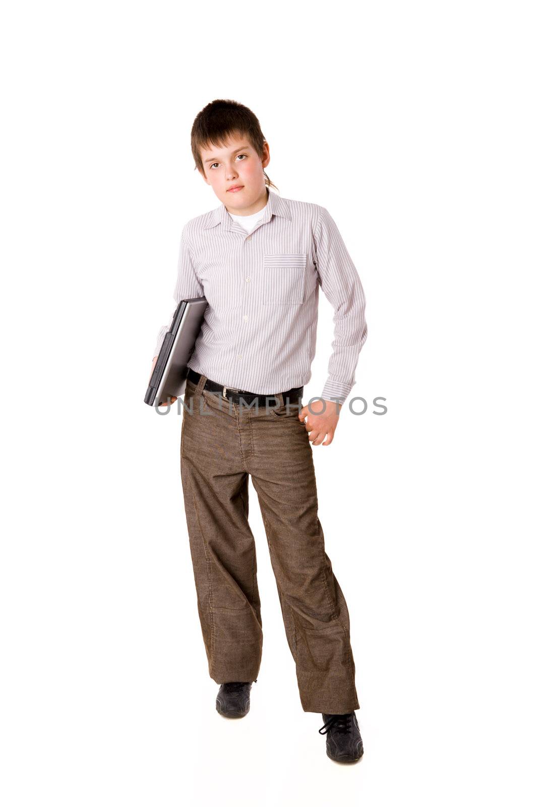 Ten years Boy holding laptop isolated on white