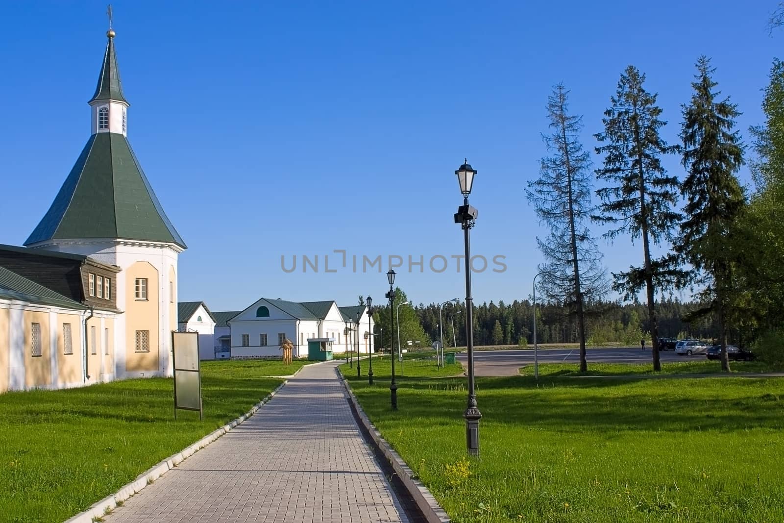 The road to Iversky monastery against  blue sky, Russia.