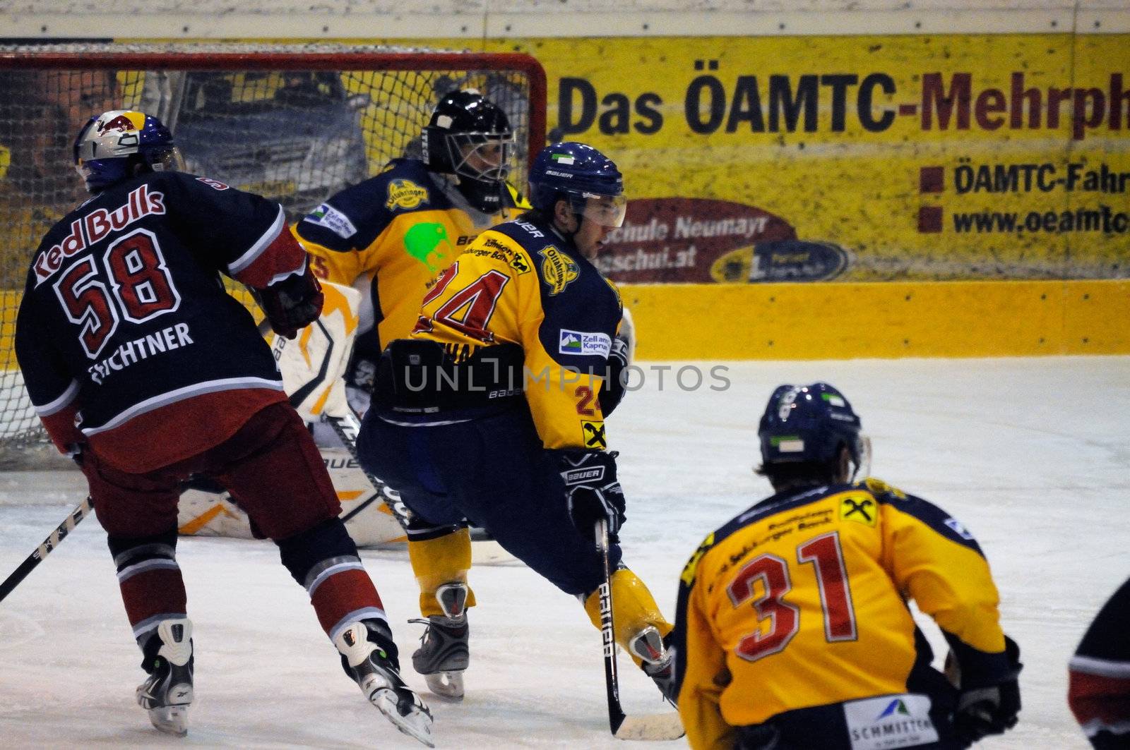 ZELL AM SEE, AUSTRIA - DECEMBER 7: Austrian National League. Scoring chance for Red bulls Feichtner. Game EK Zell am See vs. Red Bulls Salzburg (Result 4-6) on December 7, 2010, at hockey rink of Zell am See