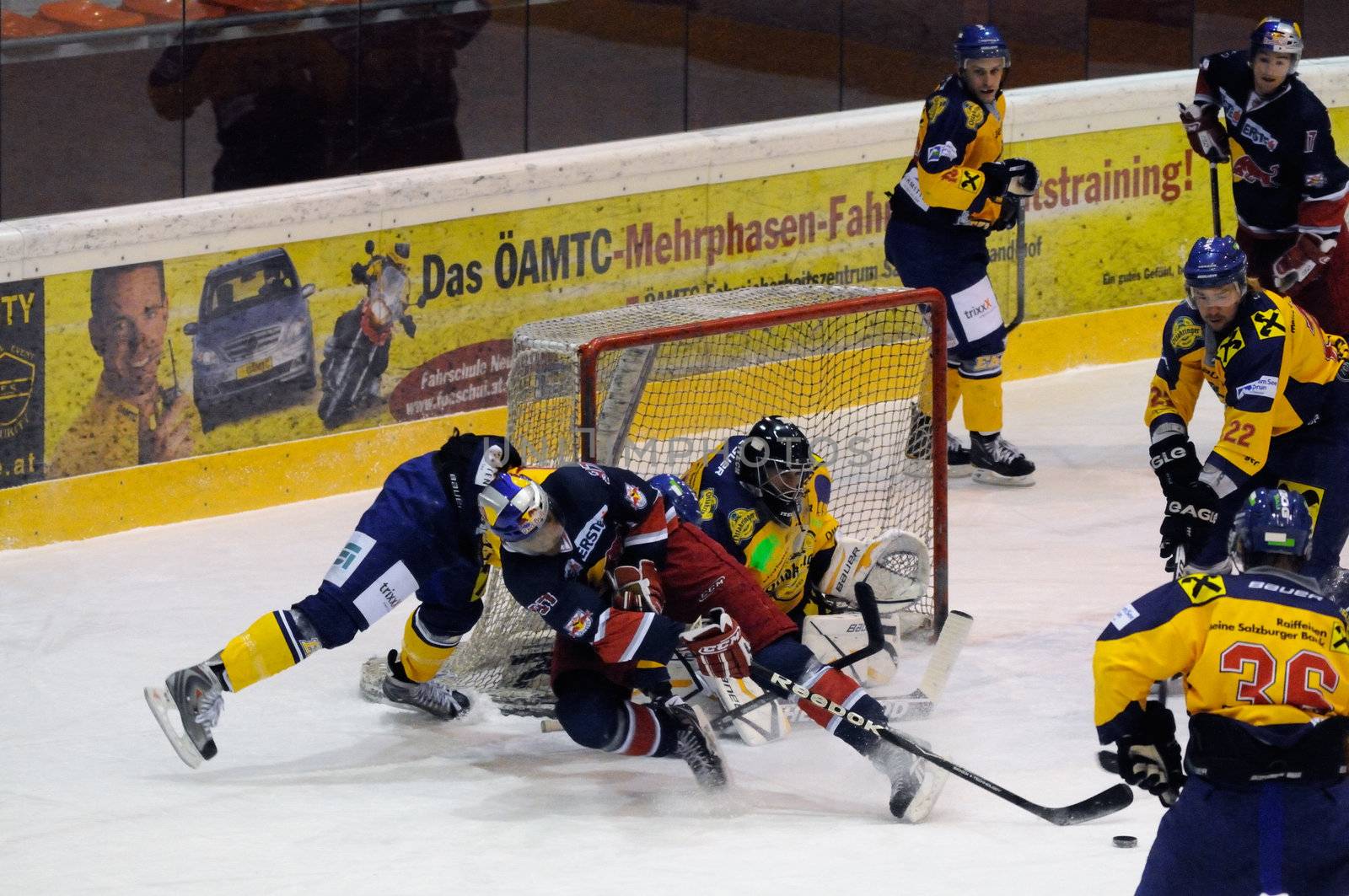 ZELL AM SEE, AUSTRIA - DECEMBER 7: Austrian National League. Action in front of Keeper Bartholomaeus. Game EK Zell am See vs. Red Bulls Salzburg (Result 4-6) on December 7, 2010, at hockey rink of Zell am See