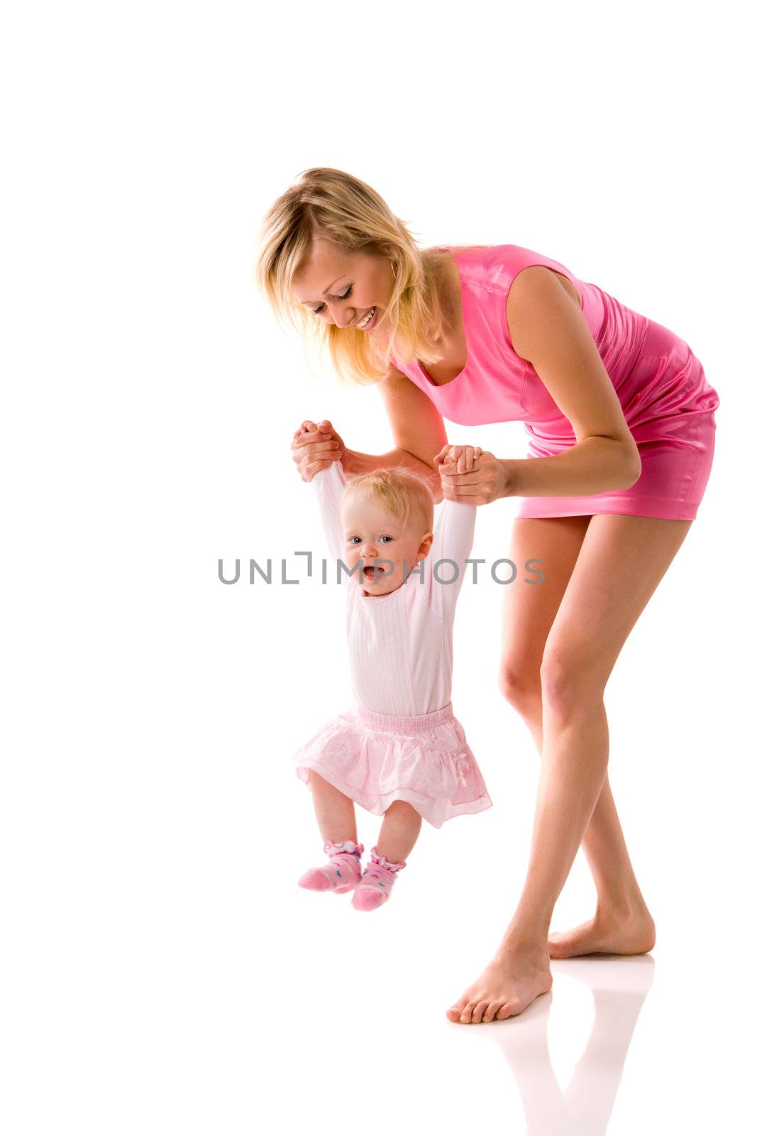 Mother holding daughter's hands playing isolated on white