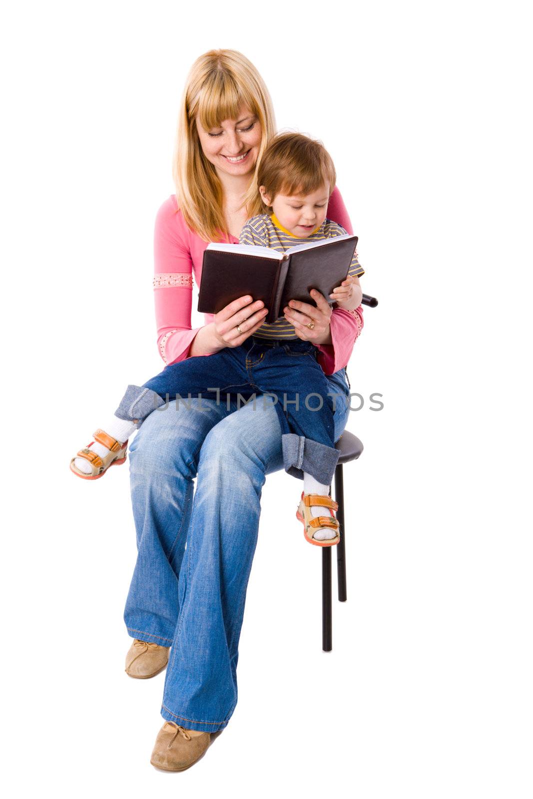 Mother reading book to her son isolated on white