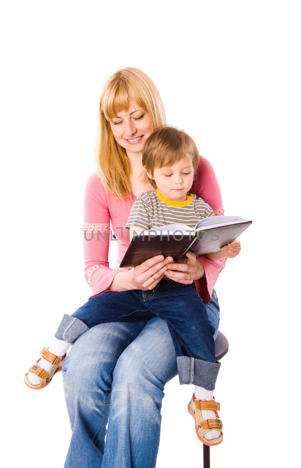Mother reading book to her son isolated on white