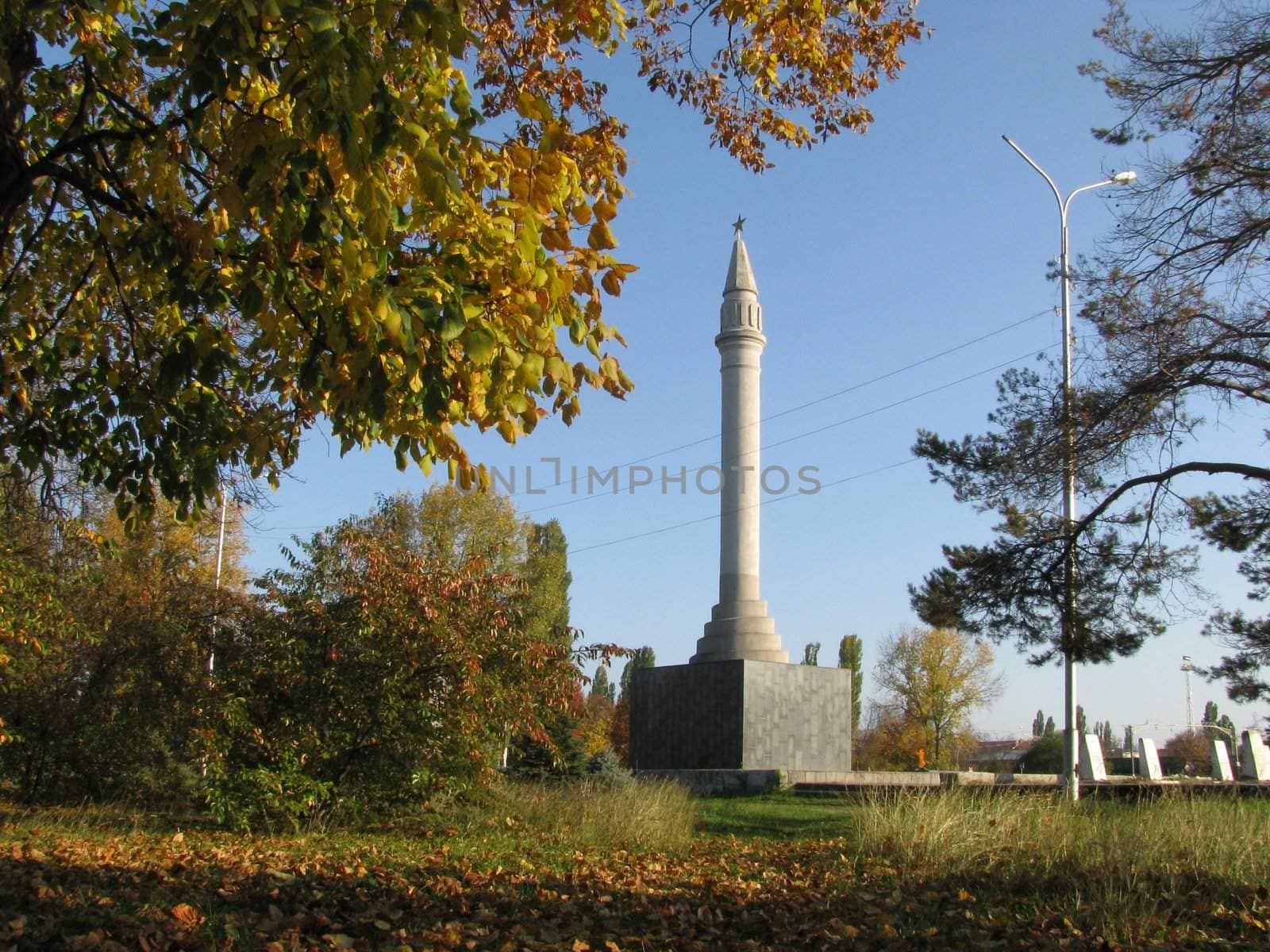 Monument; eternal flame; laid; architectral building; styles; park