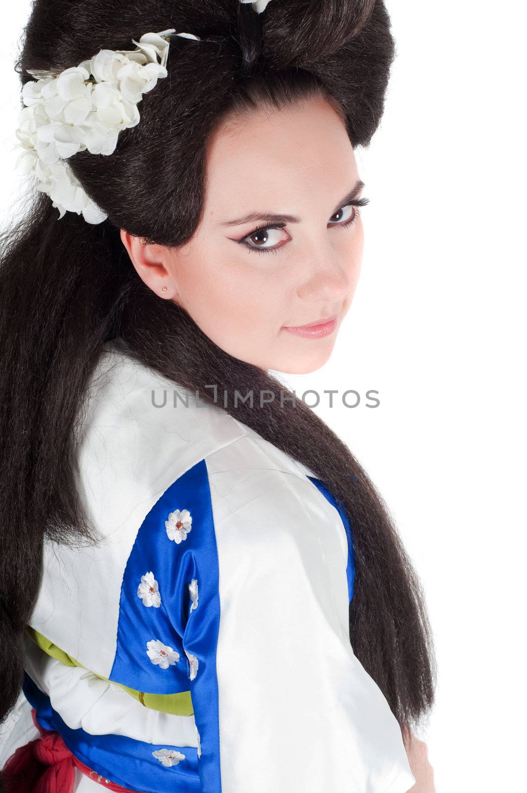 Portrait of the girl of the Asian appearance with a make-up under the geisha on a white background