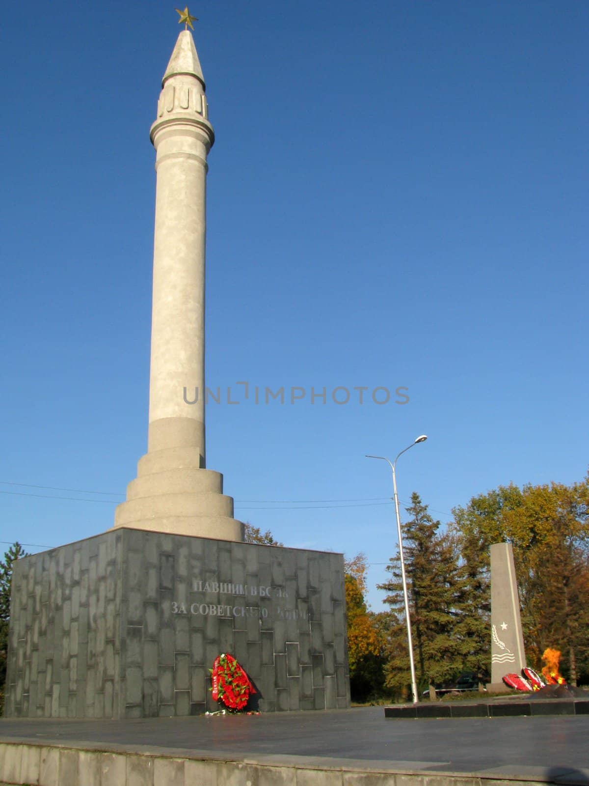 Monument; eternal flame; laid; architectral building; styles; park