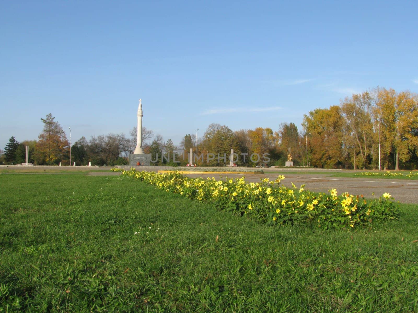 Monument; eternal flame; laid; architectral building; styles; park