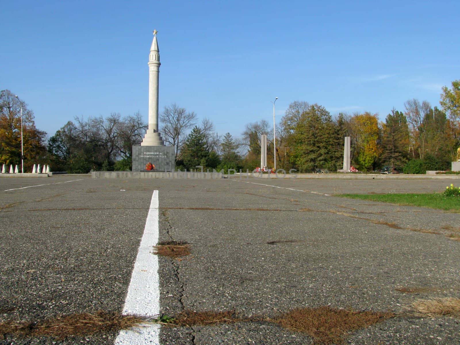 Monument; eternal flame; laid; architectral building; styles; park