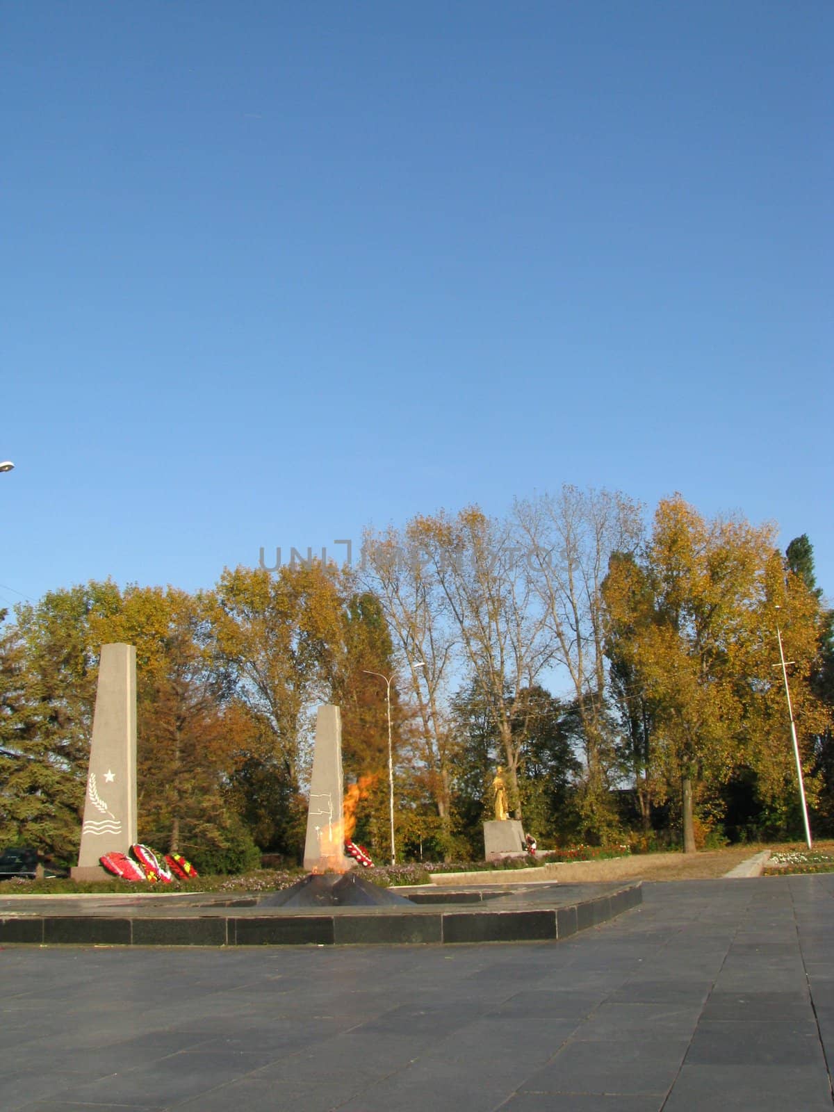 Monument; eternal flame; laid; architectral building; styles; park