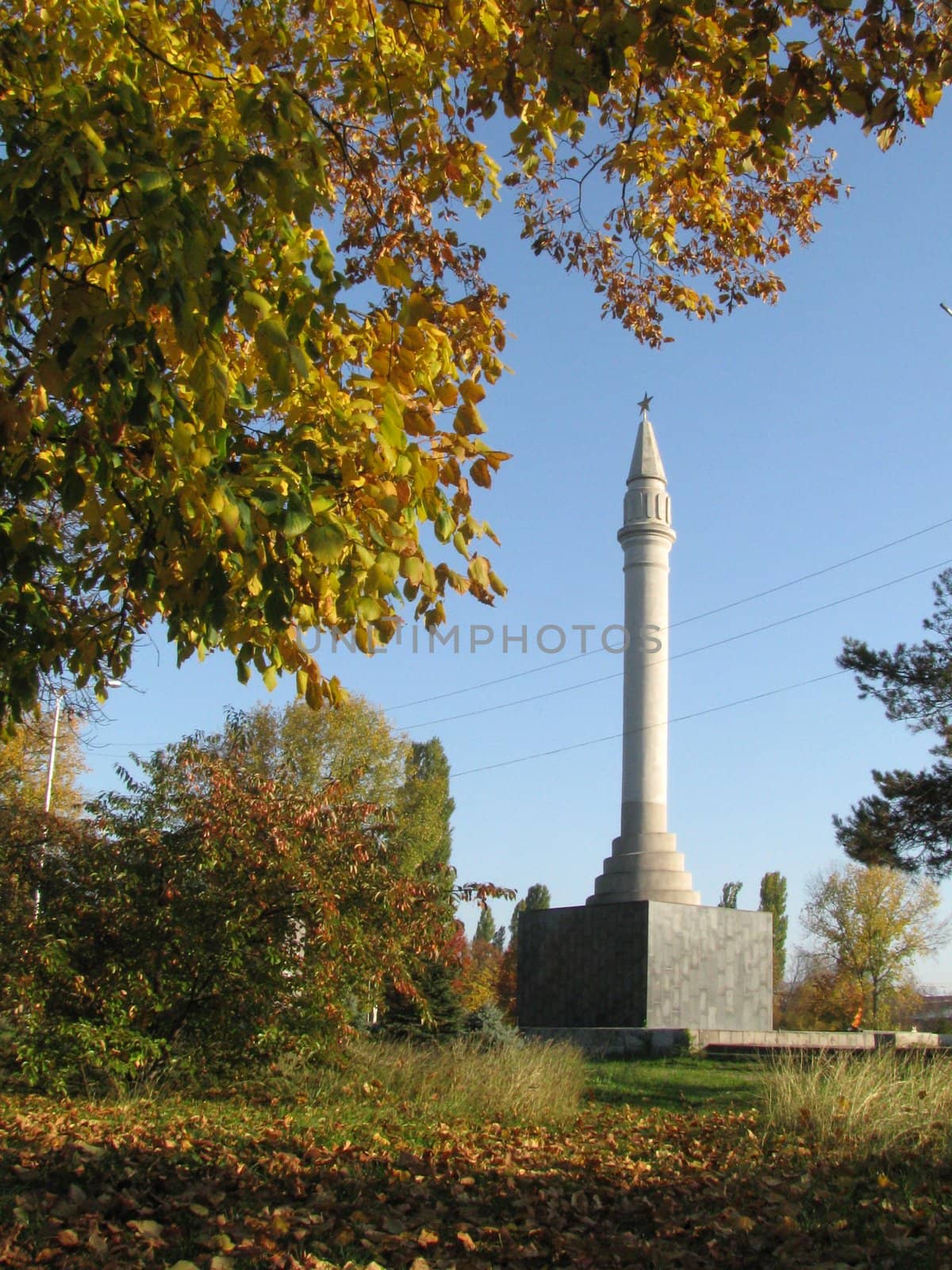 Monument; eternal flame; laid; architectral building; styles; park