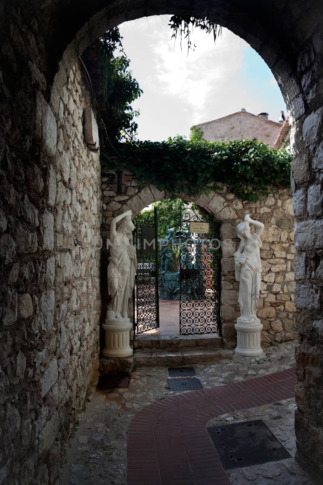 Old courtyard and walls in the village of Eze, France