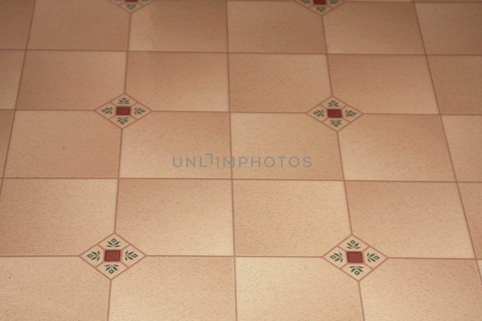 Current kitchen linoleum in tan and burgundy.  Home improvement with flooring and linoleum. Linoleum floors for home maintenance.