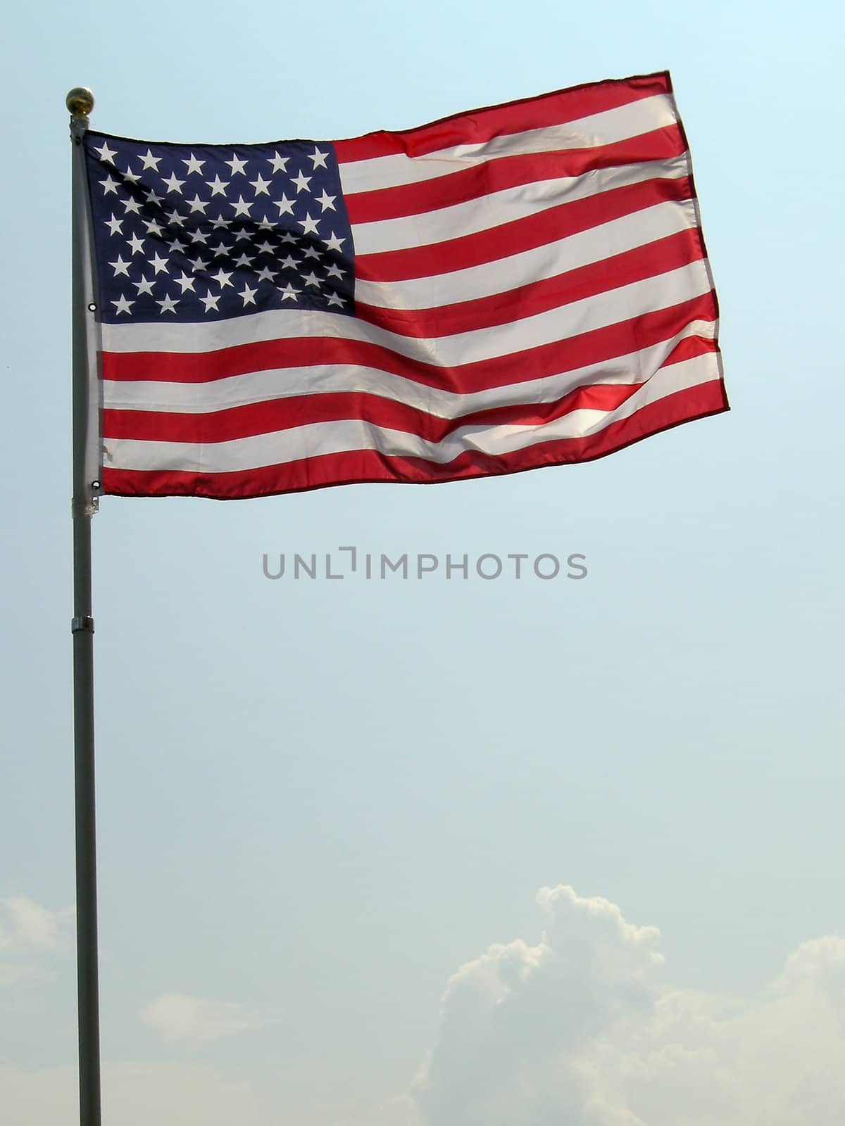 waving USA flag vertical detail photo
