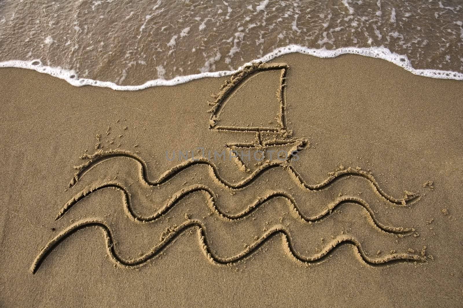 waves and a small sail boat written in sand on a beach, wave approaching