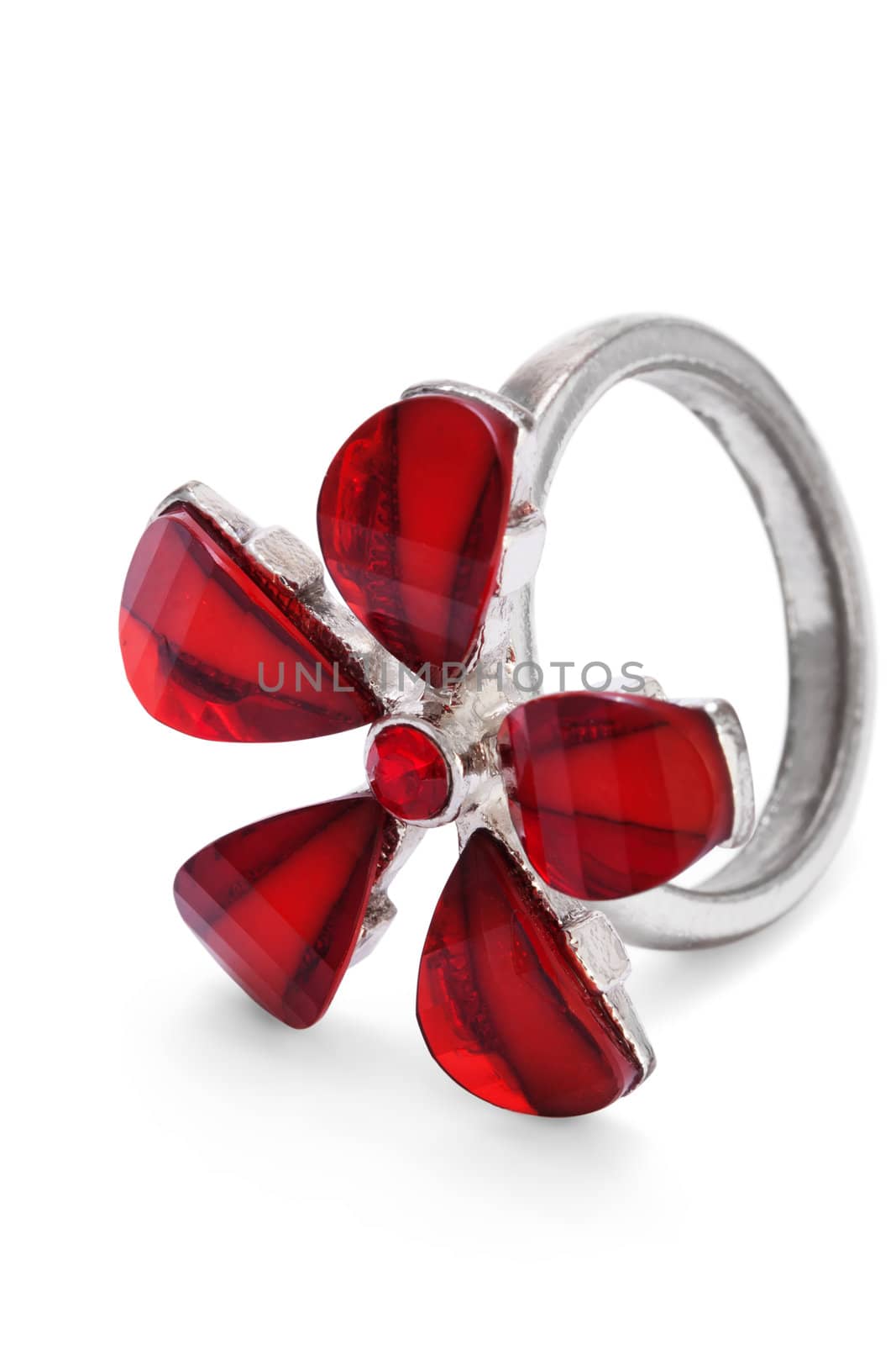 Finger ring with red stone flower isolated on the white background
