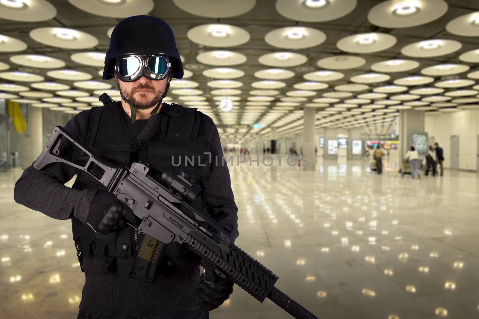 Defense against terrorism, a soldier in an airport