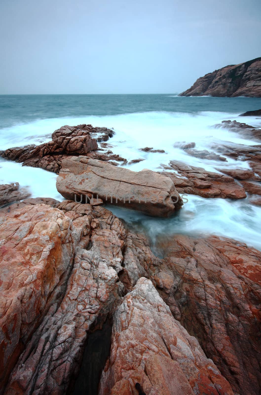 Sea stones at sunset in hong kong.