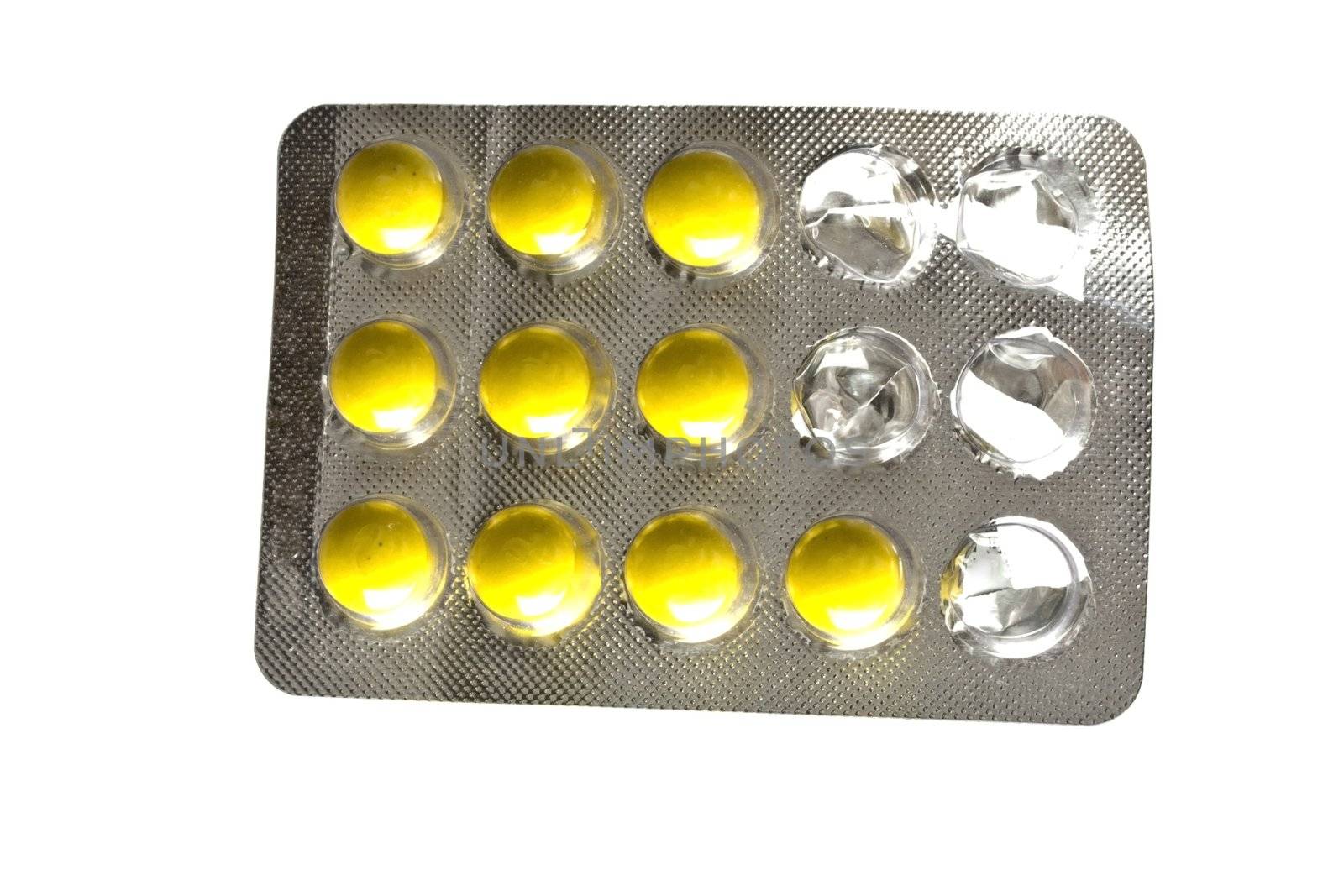 Package of Yellow Pills isolated on white