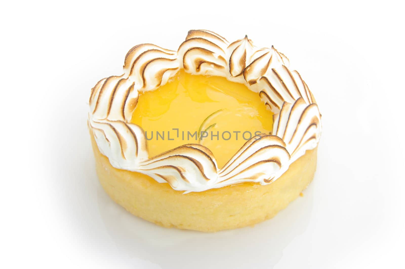 A delicious single serve lemon meringue tart. Shot on white