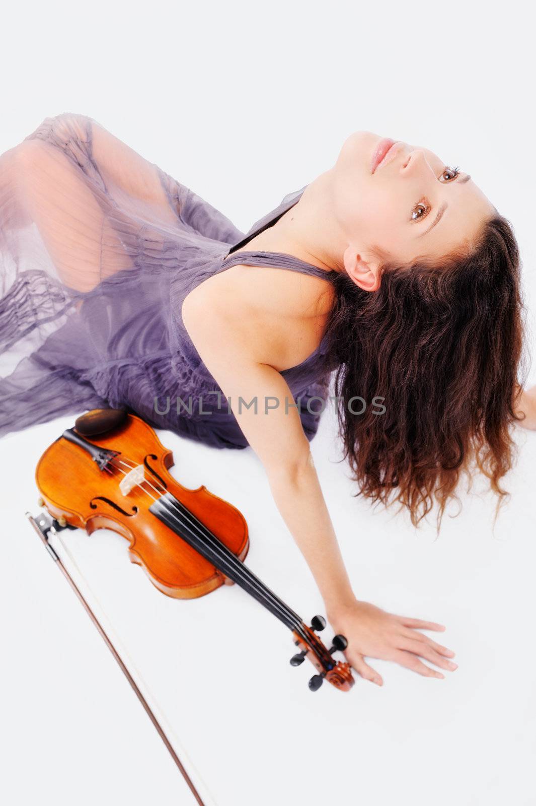 Violin player posing isolated over white background