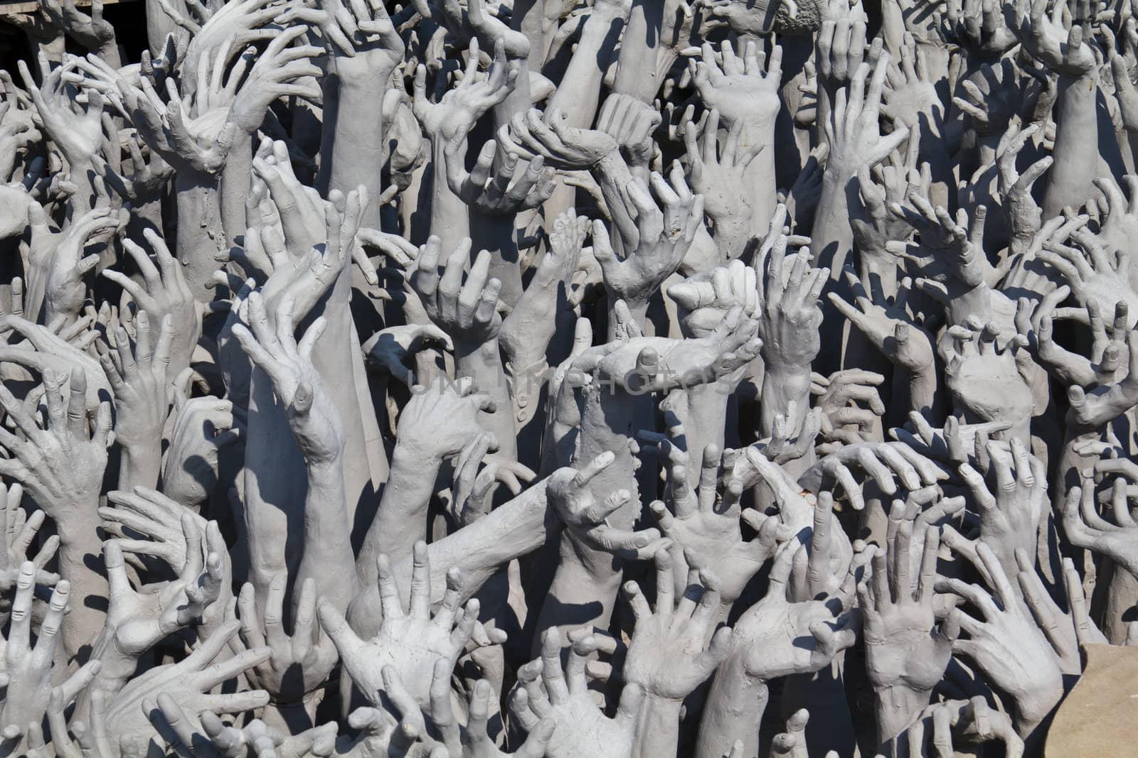 Sculptural composition at Wat Rong Khun temple in Chiang Rai, Th by lavoview