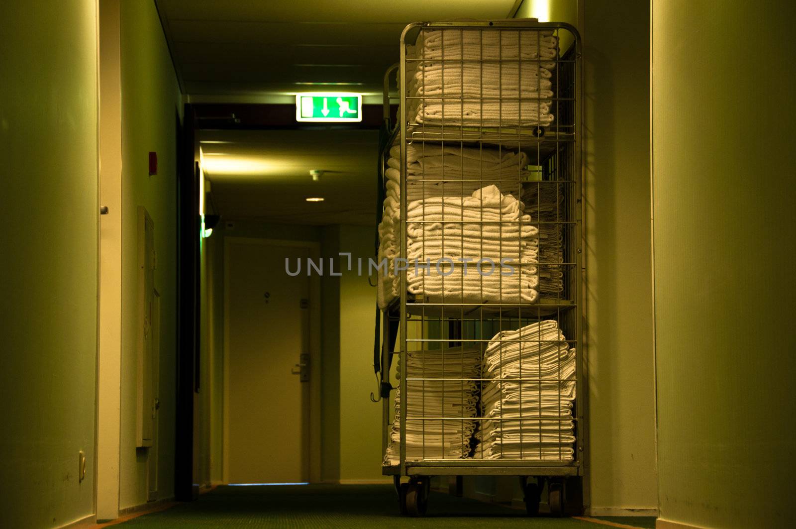 Hotel floor with towels on trolley