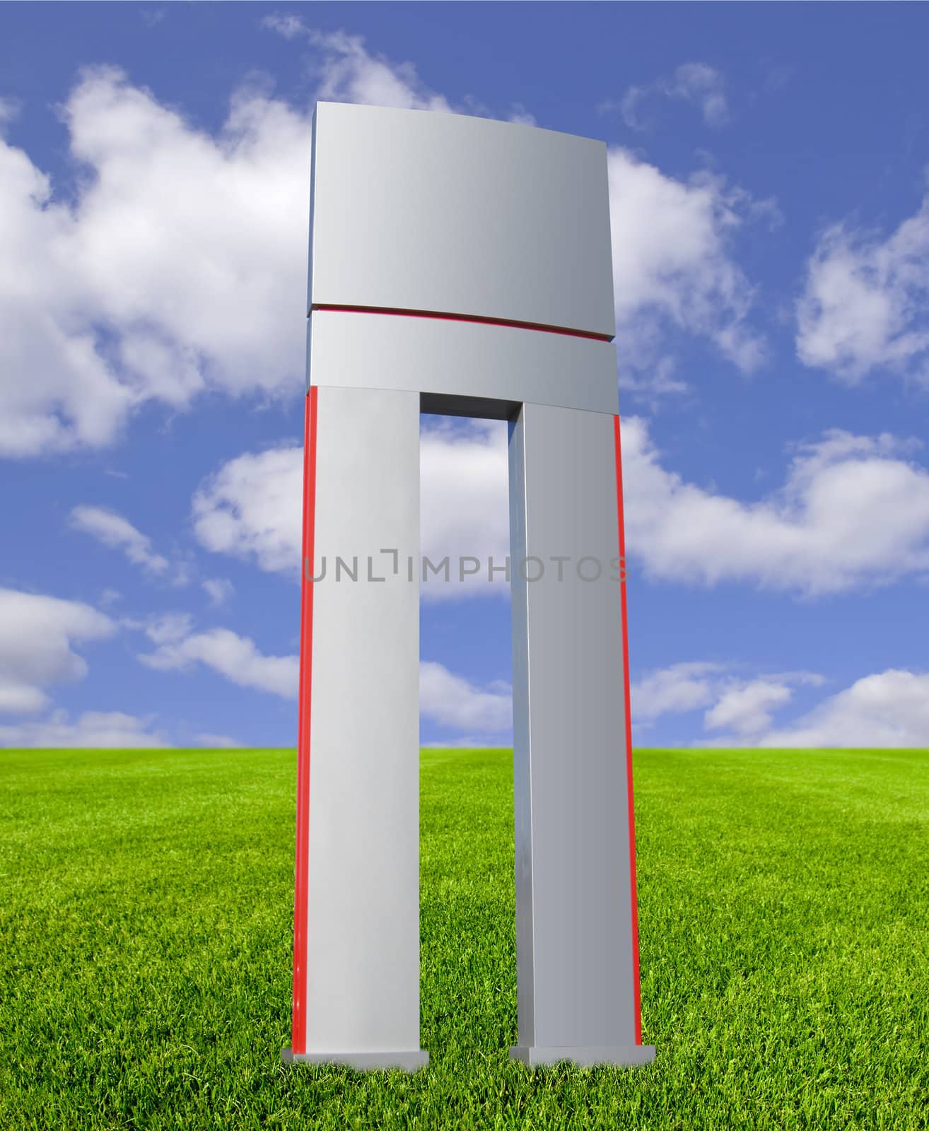 Blank signpost in brushed aluminum on lawn with blue sky and clouds, isolated with clipping path