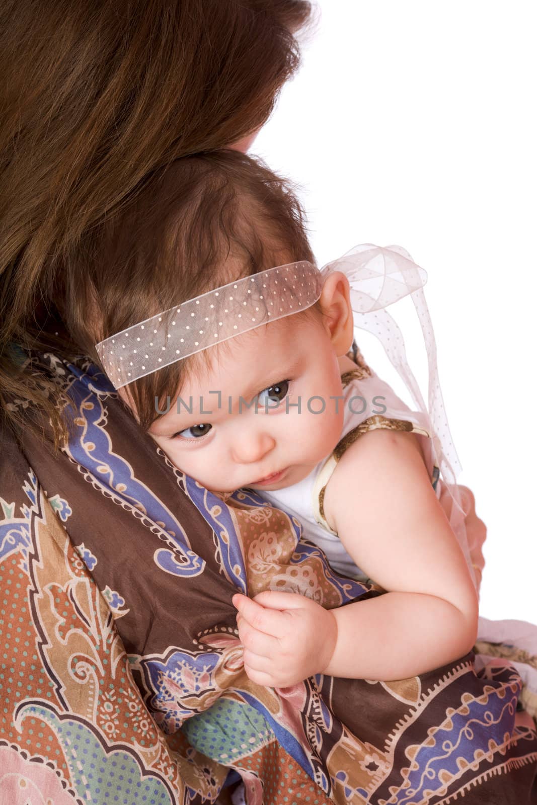 Mother with sad baby on shoulder isolated