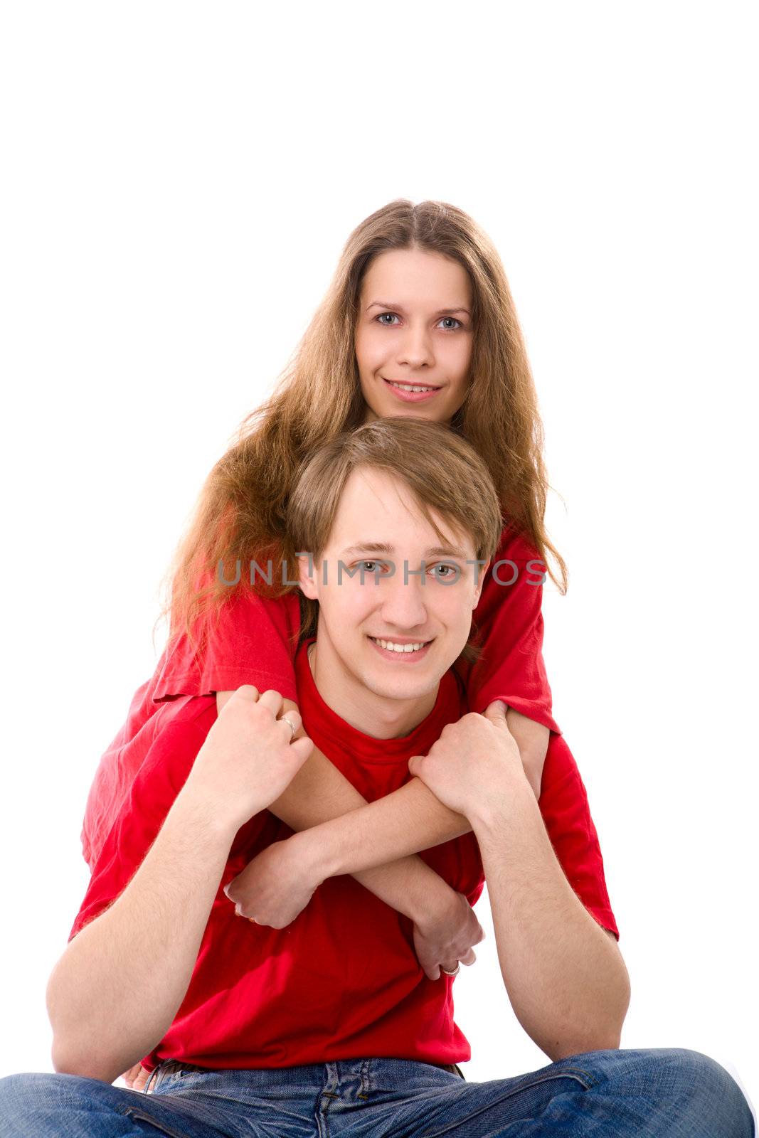 Young Couple staring at you isolated on white