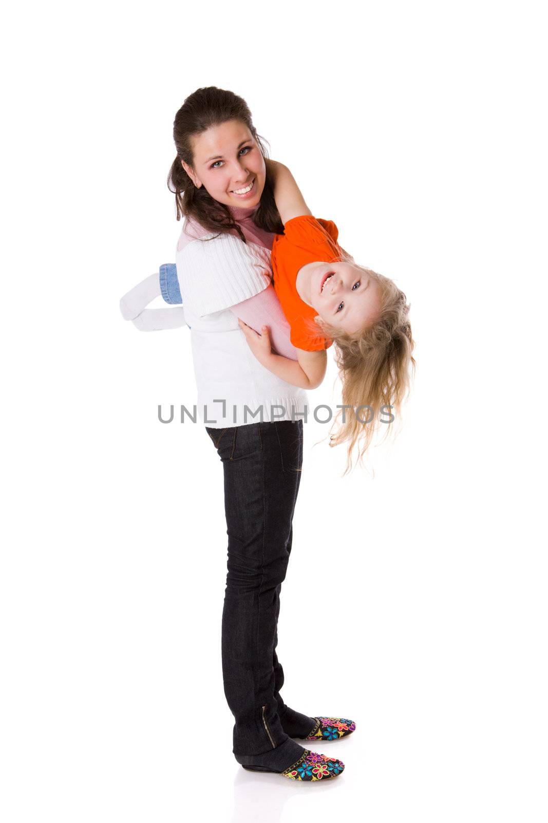 Mother playing with daughter isolated on white