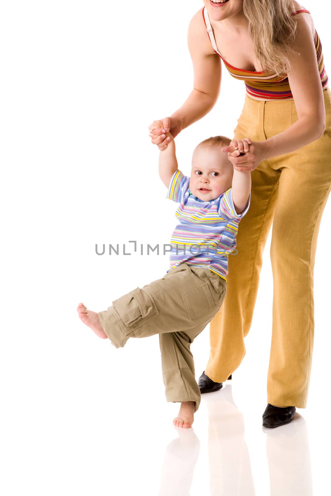 Mother teaching to walk her son isolated on white