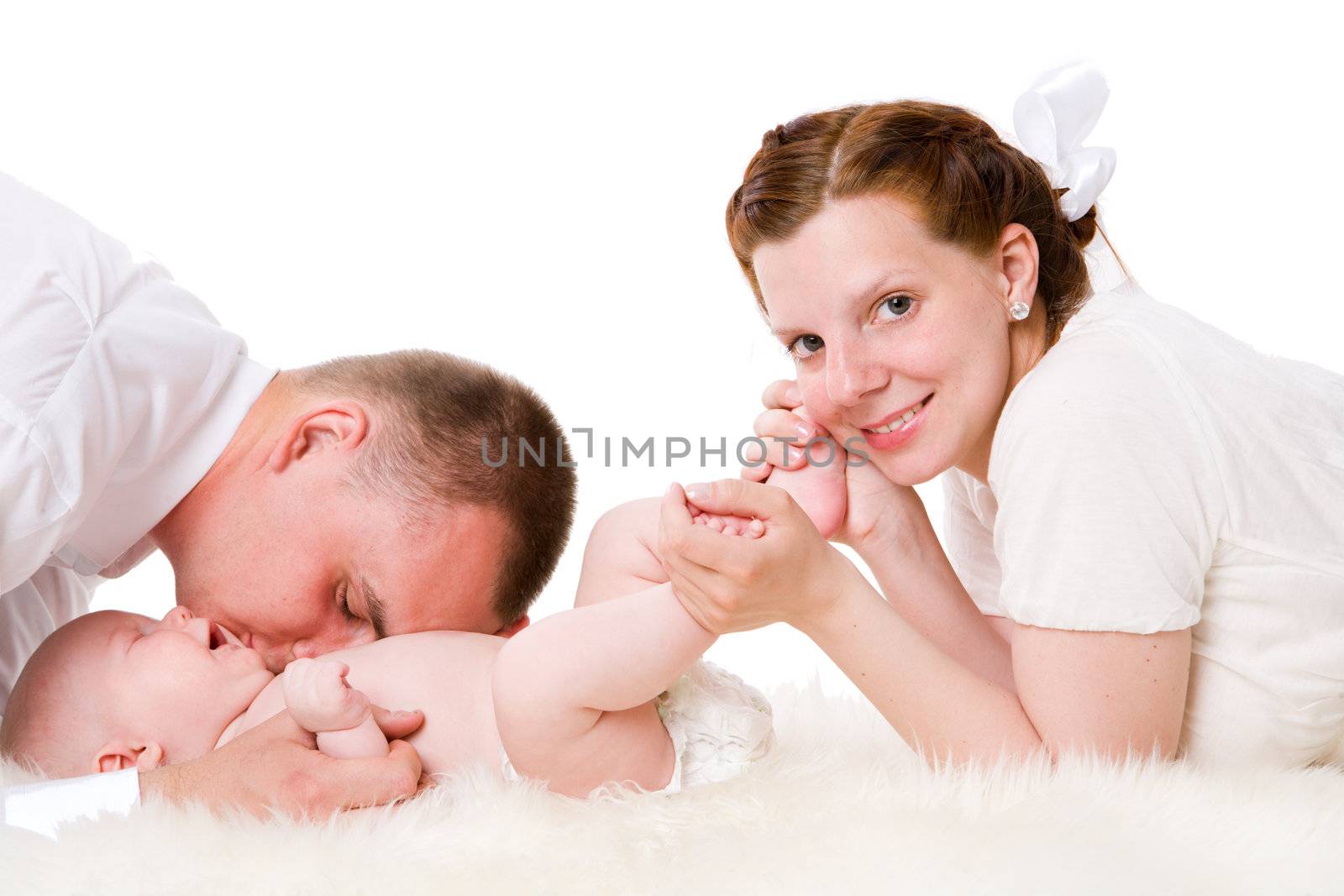 Happy Family enjoying baby together isolated on white